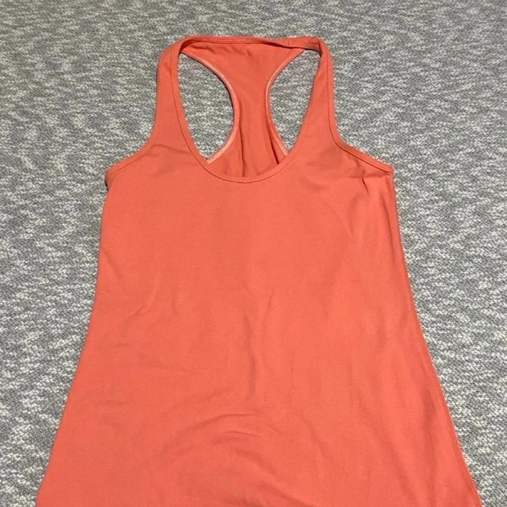 Lululemon Women's 6 rest less Yoga Active Top Orange. SKU-B243